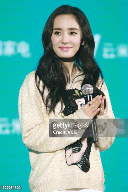 Actress Yang Mi attends a promotional event during the Appliance and Electronics World Expo 2018 on March 9, 2018 in Shanghai, China.
