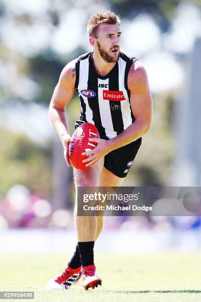 Lynden Dunne looks upfield during the JLT Community Series AFL match between Collingwood Magpies and the Western Bulldogs at Ted Summerton...