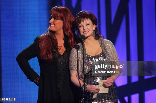 Singers Wynonna Judd and Naomi Judd performs onstage at the 43rd Annual CMA Awards at the Sommet Center on November 11, 2009 in Nashville, Tennessee.