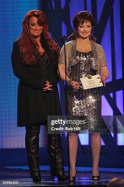 Singers Wynonna Judd and Naomi Judd performs onstage at the 43rd Annual CMA Awards at the Sommet Center on November 11, 2009 in Nashville, Tennessee.