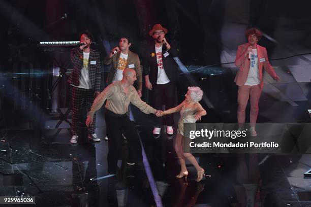 Italian band Lo stato Sociale with dancer Paddy Jones on the Ariston stage during the 68th Festival di Sanremo. Sanremo, February 10th 2018