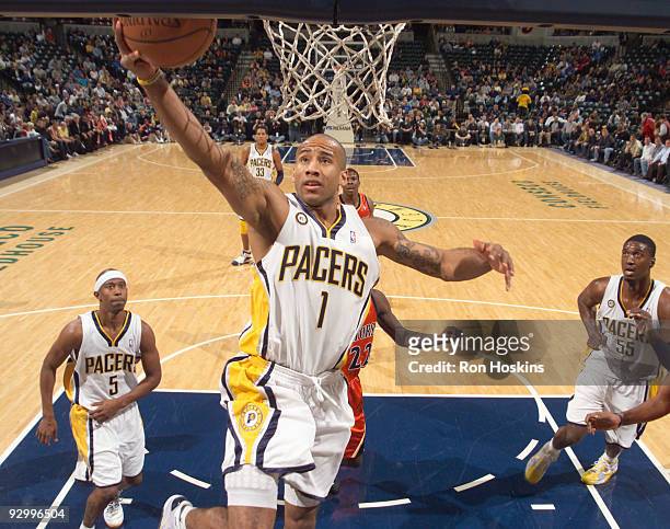 Dahntay Jones of the Indiana Pacers lays the ball up against the Golden State Warriors at Conseco Fieldhouse on November 11, 2009 in Indianapolis,...