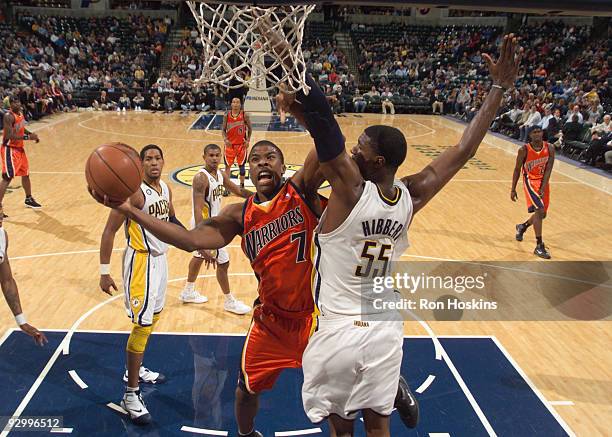 Kelenna Azubuike of the Golden State Warriors battles Roy Hibbert of the Indiana Pacers at Conseco Fieldhouse on November 11, 2009 in Indianapolis,...