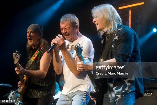 Roger Glover and Ian Gillan and Steve Morse of Deep Purple perform at Clyde Auditorium on November 11, 2009 in Glasgow, Scotland.