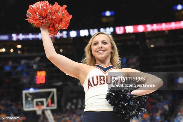 An Auburn cheerleader during a Southeastern Conference Basketball Tournament game between Auburn and Alabama on March 09 at Scottrade Center, St....