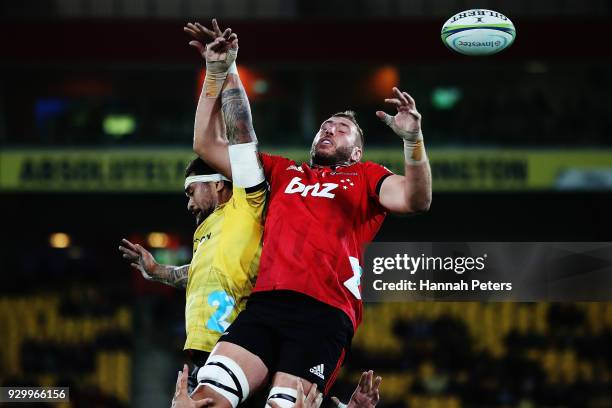 Vaea Fifita of the Hurricanes competes with Luke Romano of the Crusaders in the lineout during the round four Super Rugby match between the...