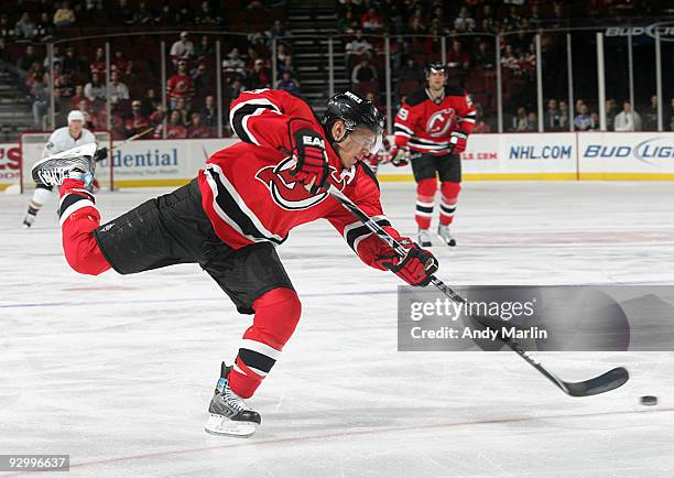 Zach Parise of the New Jersey Devils fires a shot against the Anaheim Ducks during their game at the Prudential Center on November 11, 2009 in...