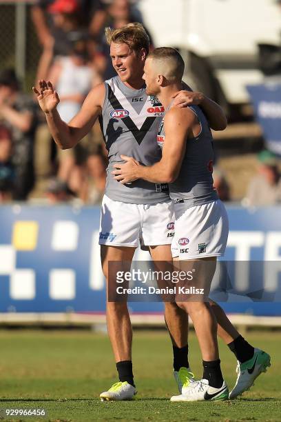 Jack Watts of the Power celebrates with Robbie Gray of the Power during the JLT Community Series AFL match between Port Adelaide Power and the...