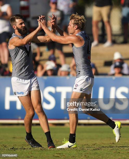 Justin Westhoff of the Powerof Canberra United Jack Watts of the Power during the JLT Community Series AFL match between Port Adelaide Power and the...
