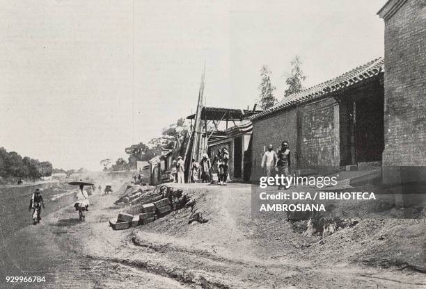 The road in front of the English embassy in Beijing, China, Boxer Rebellion , photograph by R Alt, from L'Illustrazione Italiana, Year XXVII, No 27,...