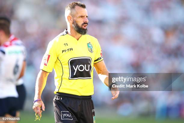 Referee Gavin Badger watches on during the round one NRL match between the Wests Tigers and the Sydney Roosters at ANZ Stadium on March 10, 2018 in...