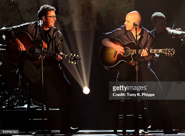Musicians Vince Gill and Chris Daughtry perform onstage the 43rd Annual CMA Awards at the Sommet Center on November 11, 2009 in Nashville, Tennessee.