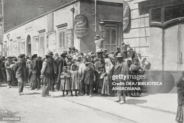 People waiting for food distribution, Portici, Vesuvius eruption, Italy, photograph by Du Bois, from L'Illustrazione Italiana, Year XXXIII, No 17,...