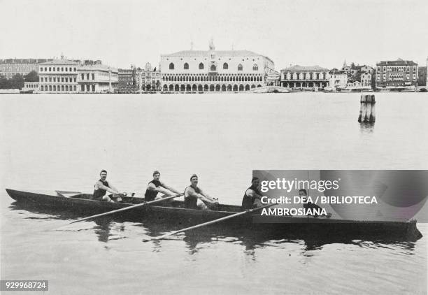 Crew from the Bucintoro club from Venice in their canoe, Italy, winners at the Olympic Games in Athens, April 24 photograph by Paolo Salviati, from...