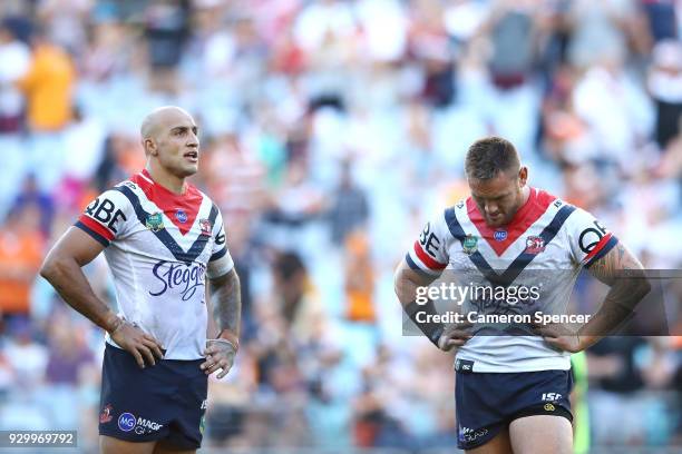 Blake Ferguson of the Roosters and Jared Waerea-Hargreaves of the Roosters look dejected after losing the round one NRL match between the Wests...