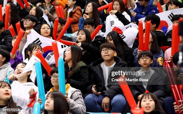 Supporters cheer in the Ice Hockey Preliminary Round - Group A game between South Korea and Japan during during day one of the PyeongChang 2018...