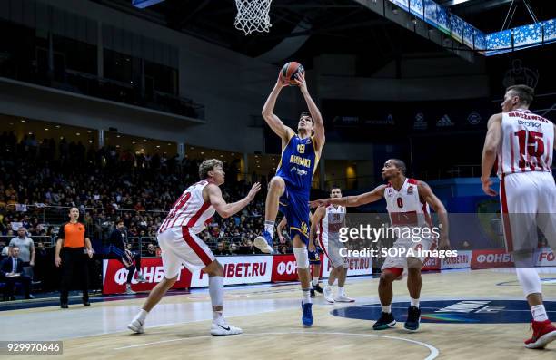 Marko Todorovic, #19 of Moscow Khimki goes up for a shot against Armani Milan defenders during the 2017/2018 Turkish Airlines Euroleague Regular...