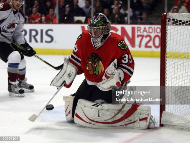 Cristobal Huet of the Chicago Blackhawks makes a save in the second period against the Colorado Avalance at the United Center on November 11, 2009 in...