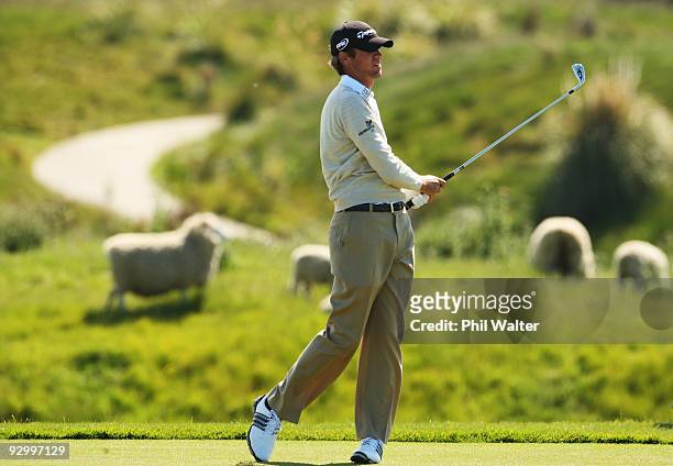 Sean O'Hair of the USA plays an approach shot on the 15th hole during the second round of The Kiwi Challenge at Cape Kidnappers on November 12, 2009...