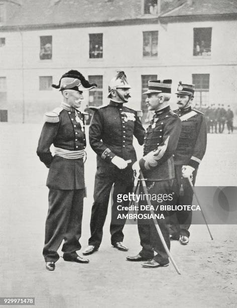 Alfred Dreyfus receiving the Legion d'Honneur in the courtyard of the Paris Military School, together with the General Gillain and Commander Targe,...