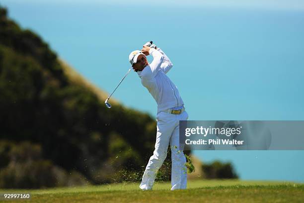 Camilo Villegas of Colombia plays a shot on the 16th hole during the second round of The Kiwi Challenge at Cape Kidnappers on November 12, 2009 in...