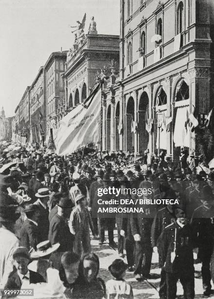 Procession of societies in via Indipendenza in Bologna, Italy, fiftieth anniversary of the uprising against the Austrians, August 8 photograph by...