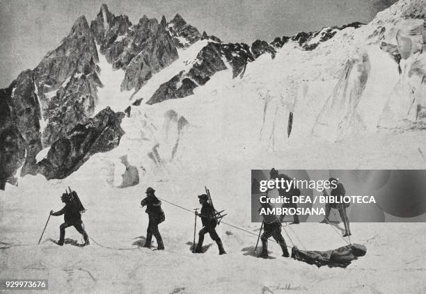 Alpine guides recovering the body of a climber missing for three years, Mont Blanc glacier, Italy, photograph by Brocherel, from L'Illustrazione...