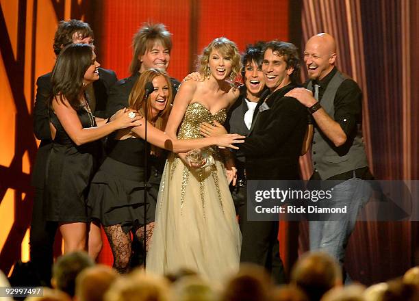 Musician Taylor Swift accepts the award for Entertainer of the Year onstage during the 43rd Annual CMA Awards at the Sommet Center on November 11,...