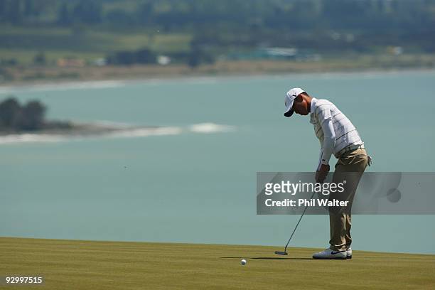 Anthony Kim of the USA plays a putt shot on the 12th hole during the second round of The Kiwi Challenge at Cape Kidnappers on November 12, 2009 in...