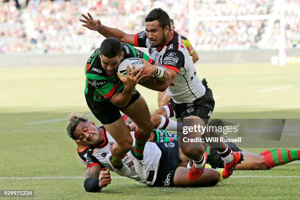 Cody Walker of the Rabbitohs scores a try during the round one NRL match between the South Sydney Rabbitohs and the New Zealand Warriors at Perth...