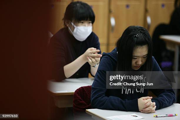South Korean students take their College Scholastic Ability Test at a school on November 12, 2009 in Seoul, South Korea. More than 670,000 high...