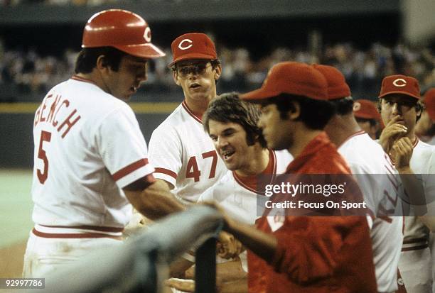 S: Outfielder Pete Rose of the Cincinnati Reds greets teammate Johnny Bench after bench hits a homerun during a MLB baseball game circa mid 1970's at...