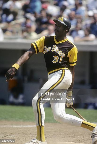 S: Outfielder Dave Winfield the San Diego Padres swings and watches the flight of his ball against the New York Mets during a circa 1970's Major...