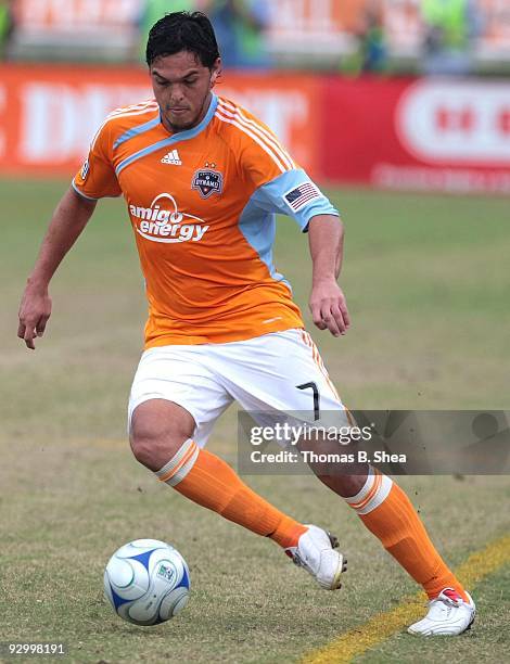 Luis Angel Landin of the Houston Dynamo dribbles against the Seattle Sounders on November 8, 2009 at Robertson Stadium in Houston, Texas.