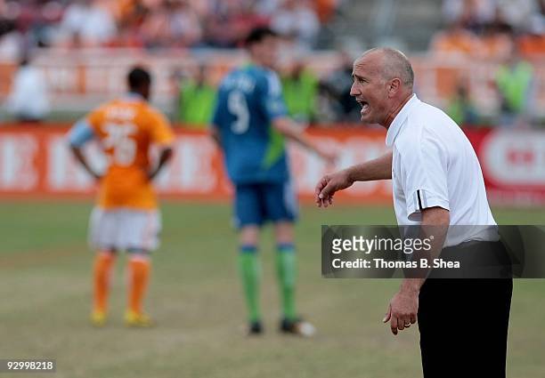 Head coach Dominic Kinnear of the Houston Dynamo yells to his players while Houston plays against the Seattle Sounders on November 8, 2009 at...