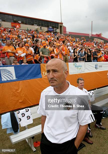 Head coach Dominic Kinnear of the Houston Dynamo walks the sidelines while Houston plays against the Seattle Sounders on November 8, 2009 at...