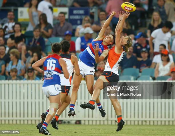 Libby Birch of the Bulldogs and Cora Staunton of the Giants contest a mark during the round six AFLW match between the Greater Western Sydney Giants...