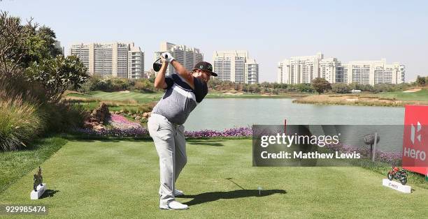 Andrew Johnston of England tees offon the 8th hole during day three of the Hero Indian Open at Dlf Golf and Country Club on March 10, 2018 in New...