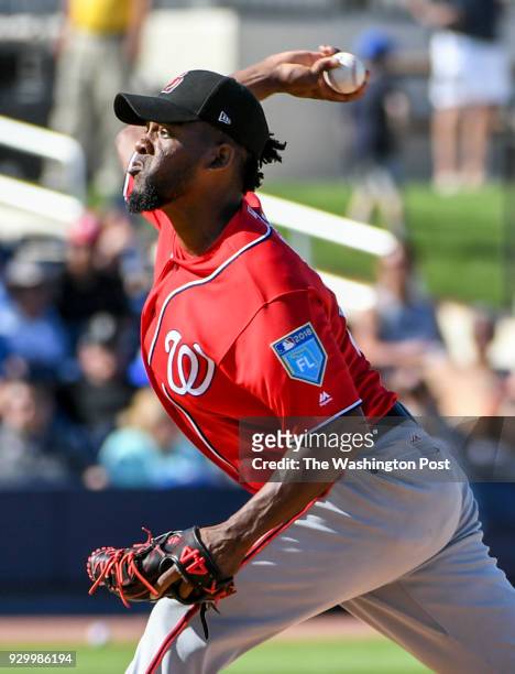 Washington Nationals RHP Wander Suero delivers against the Houston Astros at The Ballpark of the Palm Beaches.