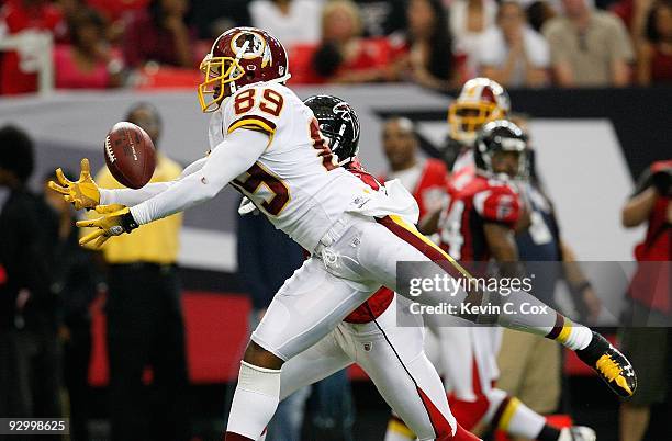 Chevis Jackson of the Atlanta Falcons defends a pass intended for Santana Moss of the Washington Redskins at Georgia Dome on November 8, 2009 in...