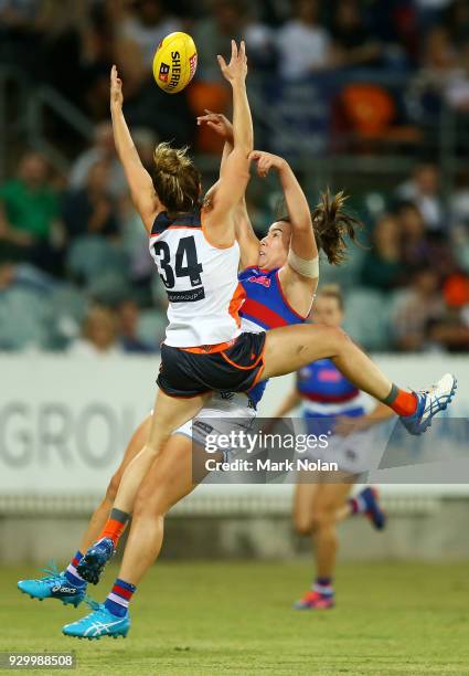 Jacinda Barclay of the Giants and Bonnie Toogood of the Bulldogs contest possession during the round six AFLW match between the Greater Western...