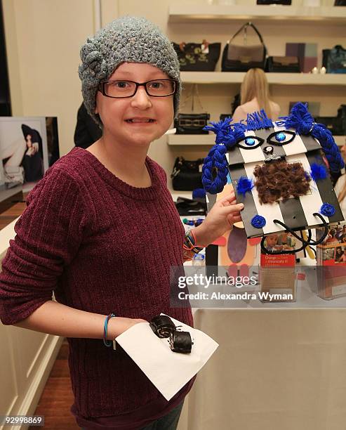 Guest attends a cocktail hosted by Platine Pop-Up Bakery and Anya Hindmarch to Benefit CoachArt on November 11, 2009 in Los Angeles, California.