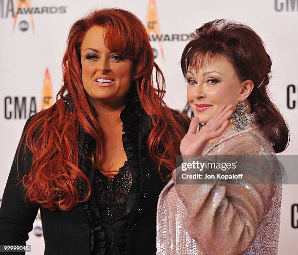 Singer Wynonna Judd and mom singer Naomi Judd of The Judds arrive at the 43rd Annual CMA Awards at the Sommet Center on November 11, 2009 in...