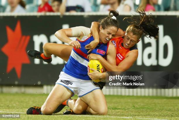 Aimee Schmidt of the Giants tackles Emma Kearney of the Bulldogs during the round six AFLW match between the Greater Western Sydney Giants and the...