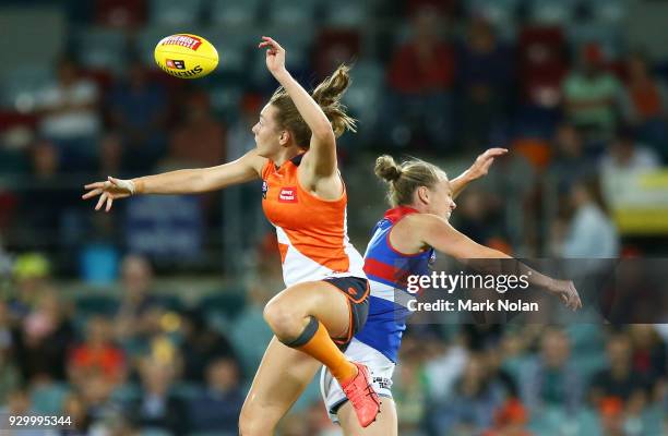 Erin McKinnon of the Giants and Aasta O'Connor of the Bulldogs contest possession during the round six AFLW match between the Greater Western Sydney...