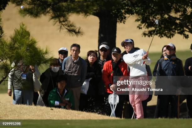 Sakura Yokomine of Japan chips onto the 14th green during the second round of the Tokohama Tire PRGR Ladies Cup at Tosa Country Club on March 10,...