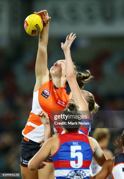 Erin McKinnon of the Giants and Lauren Spark of the Bulldogs contest possession during the round six AFLW match between the Greater Western Sydney...