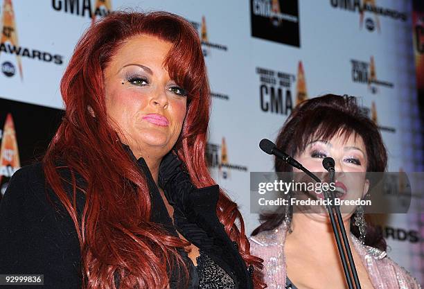 Wynonna and Naomi Judd pose in the press room during the 43rd Annual CMA Awards at the Sommet Center on November 11, 2009 in Nashville, Tennessee.