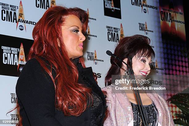 Wynonna and Naomi Judd pose in the press room during the 43rd Annual CMA Awards at the Sommet Center on November 11, 2009 in Nashville, Tennessee.