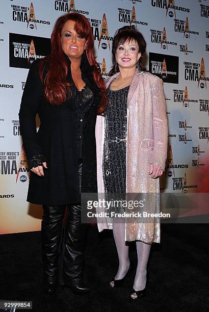 Wynonna and Naomi Judd pose in the press room during the 43rd Annual CMA Awards at the Sommet Center on November 11, 2009 in Nashville, Tennessee.